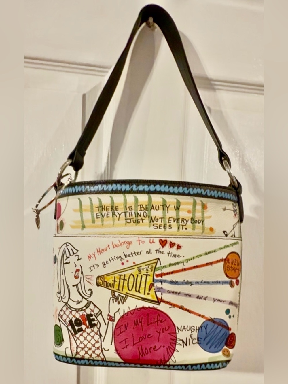 BRIGHTON “Shout It Out”  soft crossbody leather bag, designed by Tom Clancy.